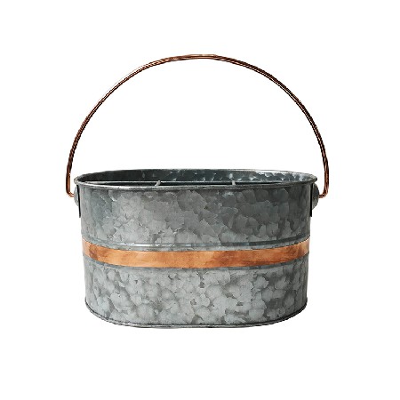 Galvanized metal utensil caddy with copper decor